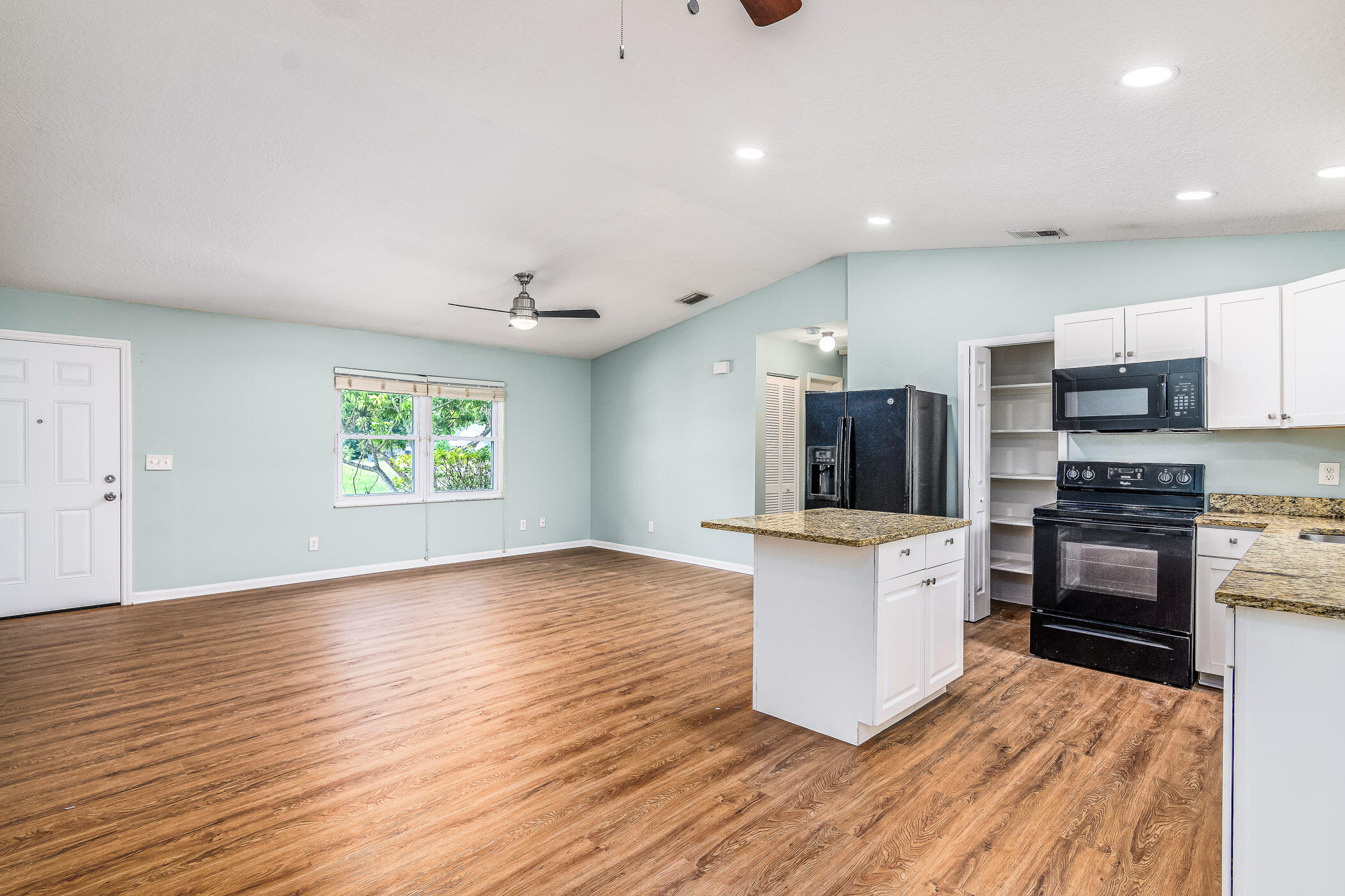 565 Town Road Southwest Palm Bay, FL 32908 - Photo 12 of 37 Spacious great room and dining room