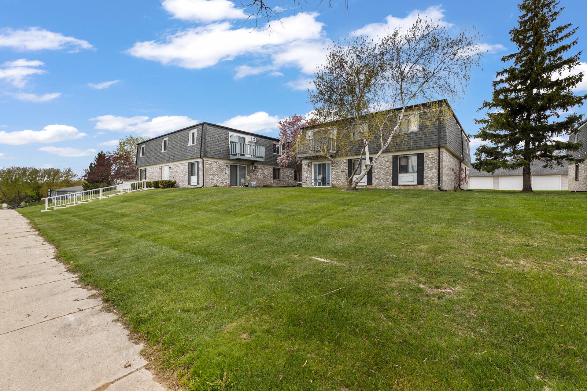 1700 Creek Road, Unit 204 West Bend, WI 53090 - Photo 2 of 25 2-Exterior_1700 Creek Rd. Unit 204