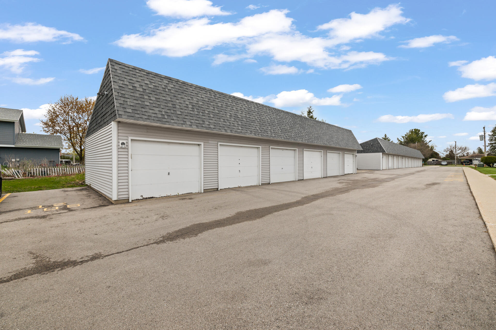 1700 Creek Road, Unit 204 West Bend, WI 53090 - Photo 23 of 25 8-Exterior_1700 Creek Rd. Unit 204