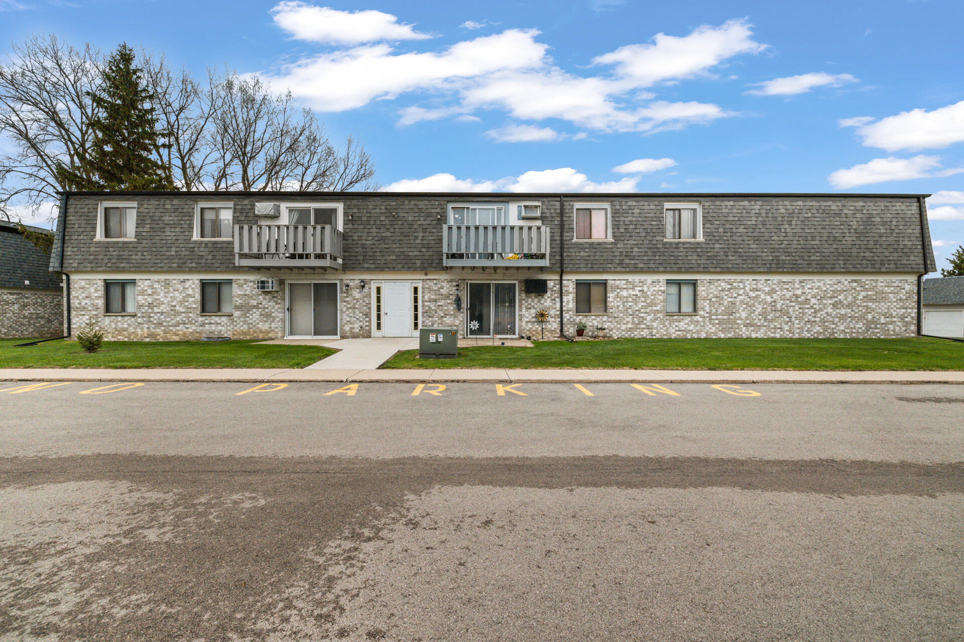 1700 Creek Road, Unit 204 West Bend, WI 53090 - Photo 5 of 25 5-Exterior_1700 Creek Rd. Unit 204