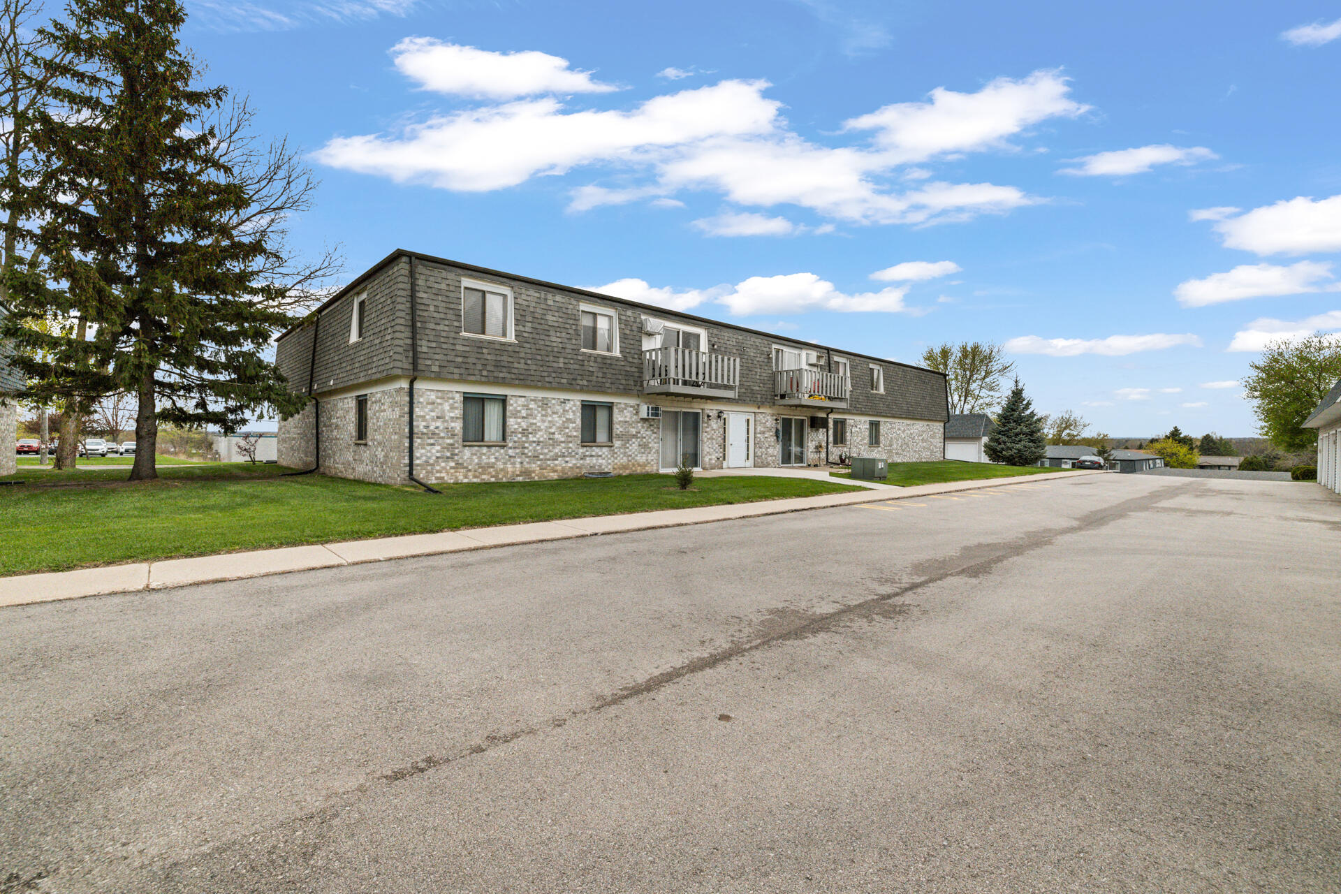 1700 Creek Road, Unit 204 West Bend, WI 53090 - Photo 6 of 25 6-Exterior_1700 Creek Rd. Unit 204