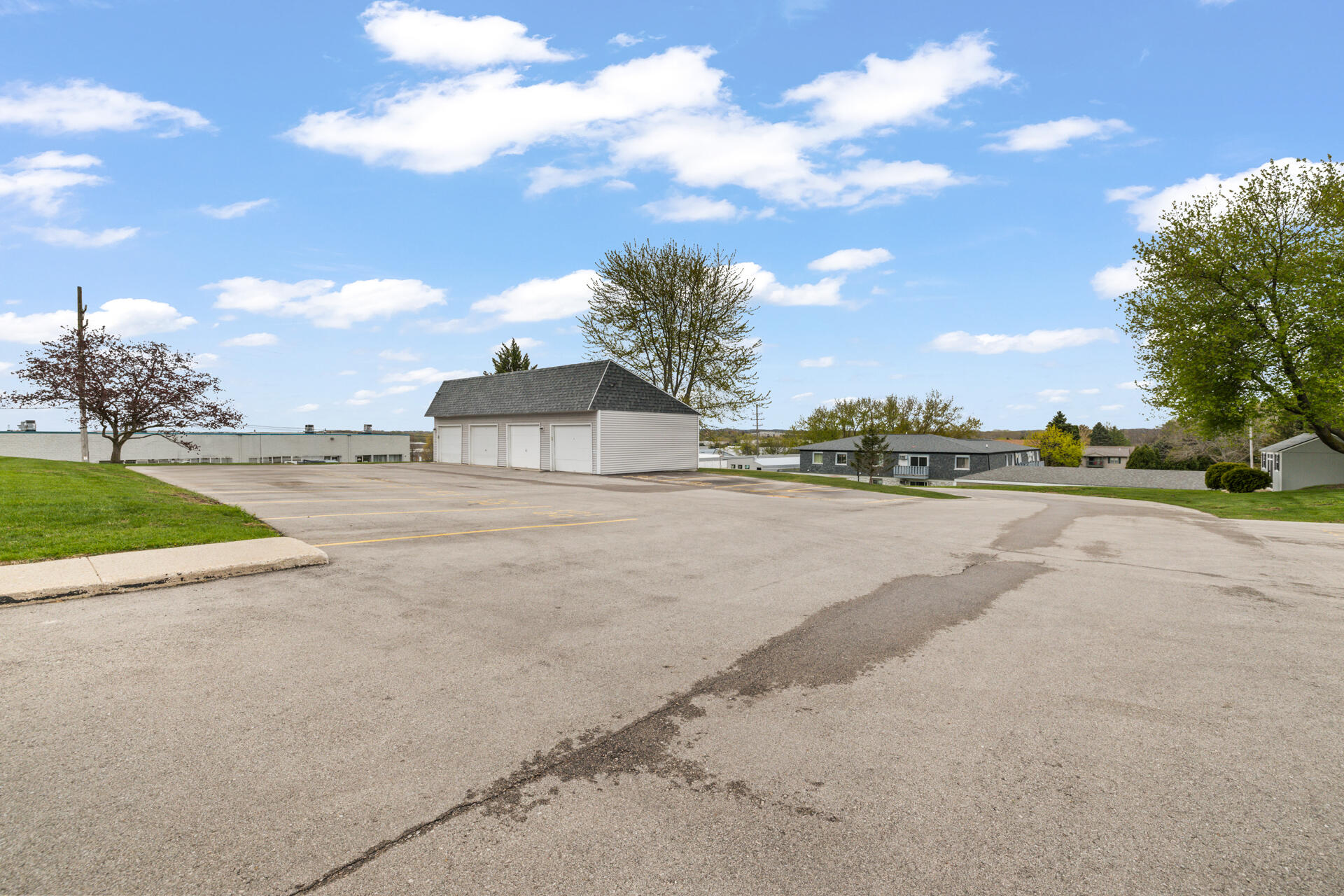1700 Creek Road, Unit 204 West Bend, WI 53090 - Photo 7 of 25 7-Exterior_1700 Creek Rd. Unit 204