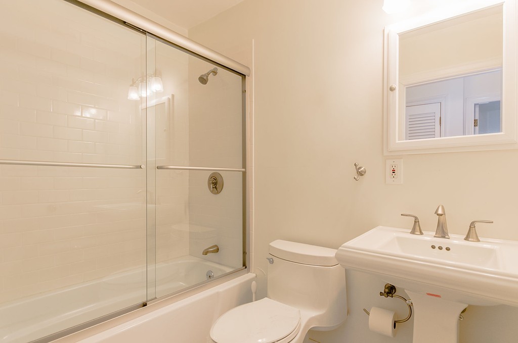 264 Country Way Needham, MA 02492 - Photo 19 of 29 a bathroom with a sink toilet and shower