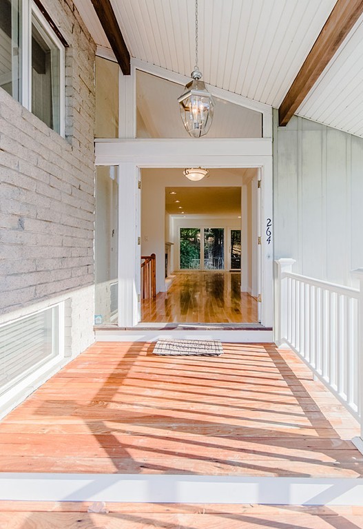264 Country Way Needham, MA 02492 - Photo 10 of 29 a view of a living room and bathroom