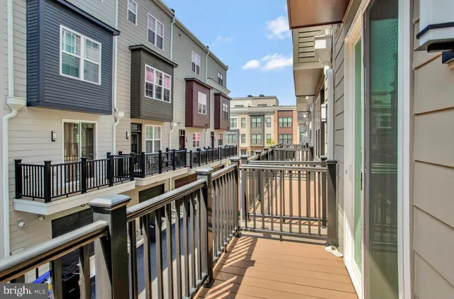 a view of a balcony with many windows