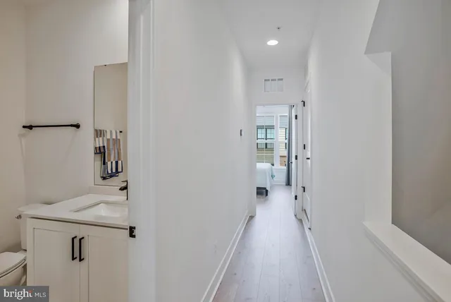 a view of a hallway with closet