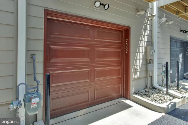 a front view of a building with many windows