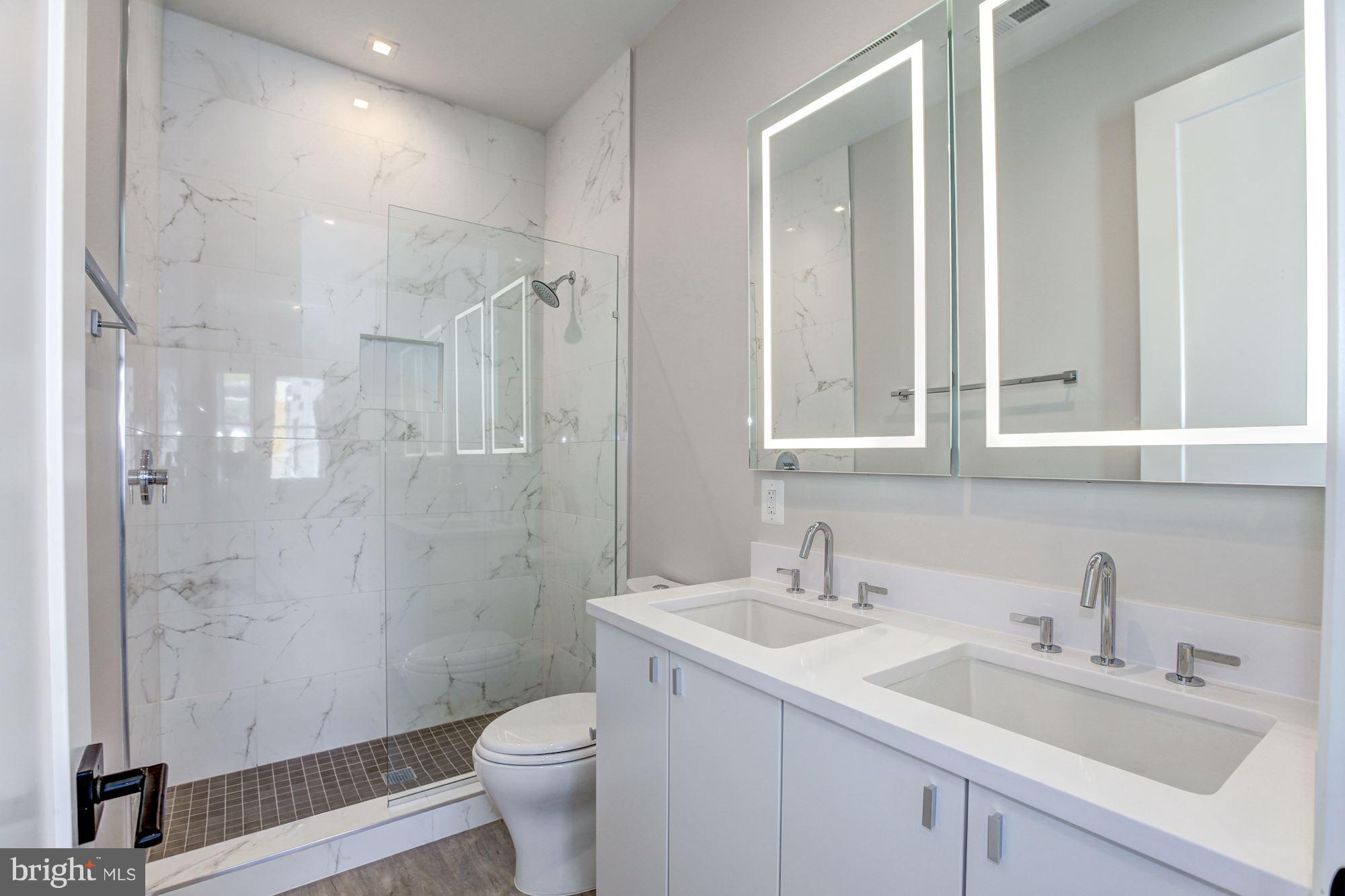 725 Euclid Street Northwest, Unit 2 Washington, DC 20001 - Photo 19 of 27 Spacious Ownr Bth w/dual Sinks and backlit mirrors