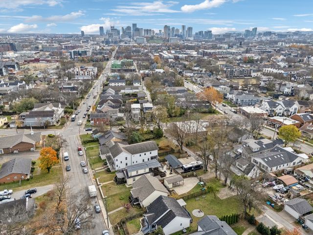 an aerial view of a city with lots of residential buildings