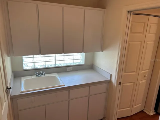 a view of a sink under an entryway