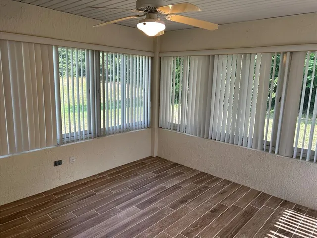 a view of wooden floor and staircase in a room