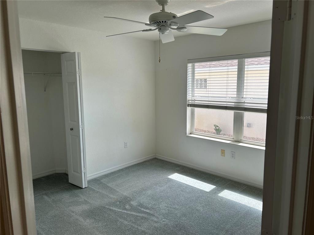 11014 Southwest 73rd Circle Ocala, FL 34476 - Photo 4 of 25 a view of an empty room with a window