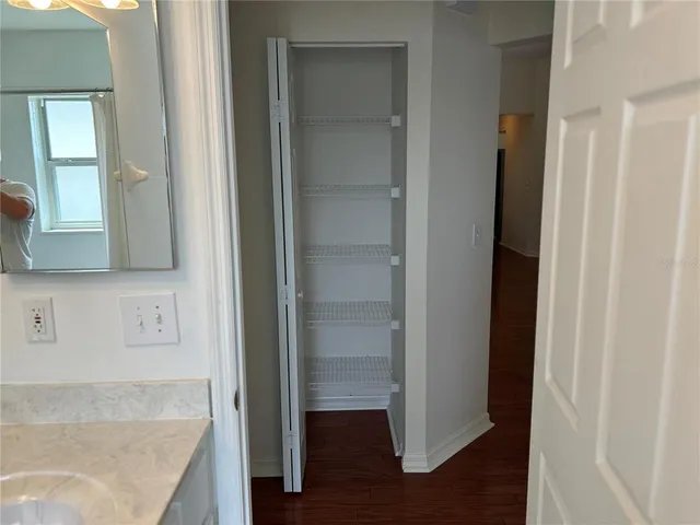 a view of bathroom with bathtub and shower