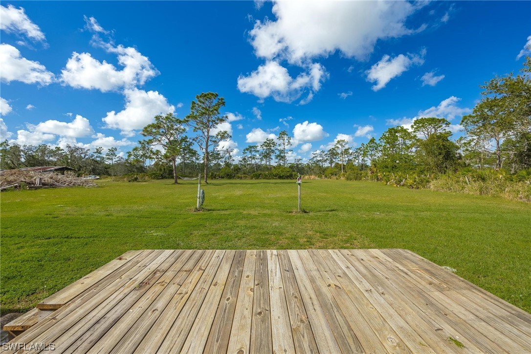 1315 Sunset Trail LaBelle, FL 33935 - Photo 14 of 23 a view of a golf course with a lake