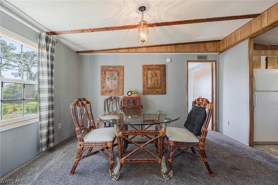 1315 Sunset Trail LaBelle, FL 33935 - Photo 4 of 23 a dining room with furniture and window