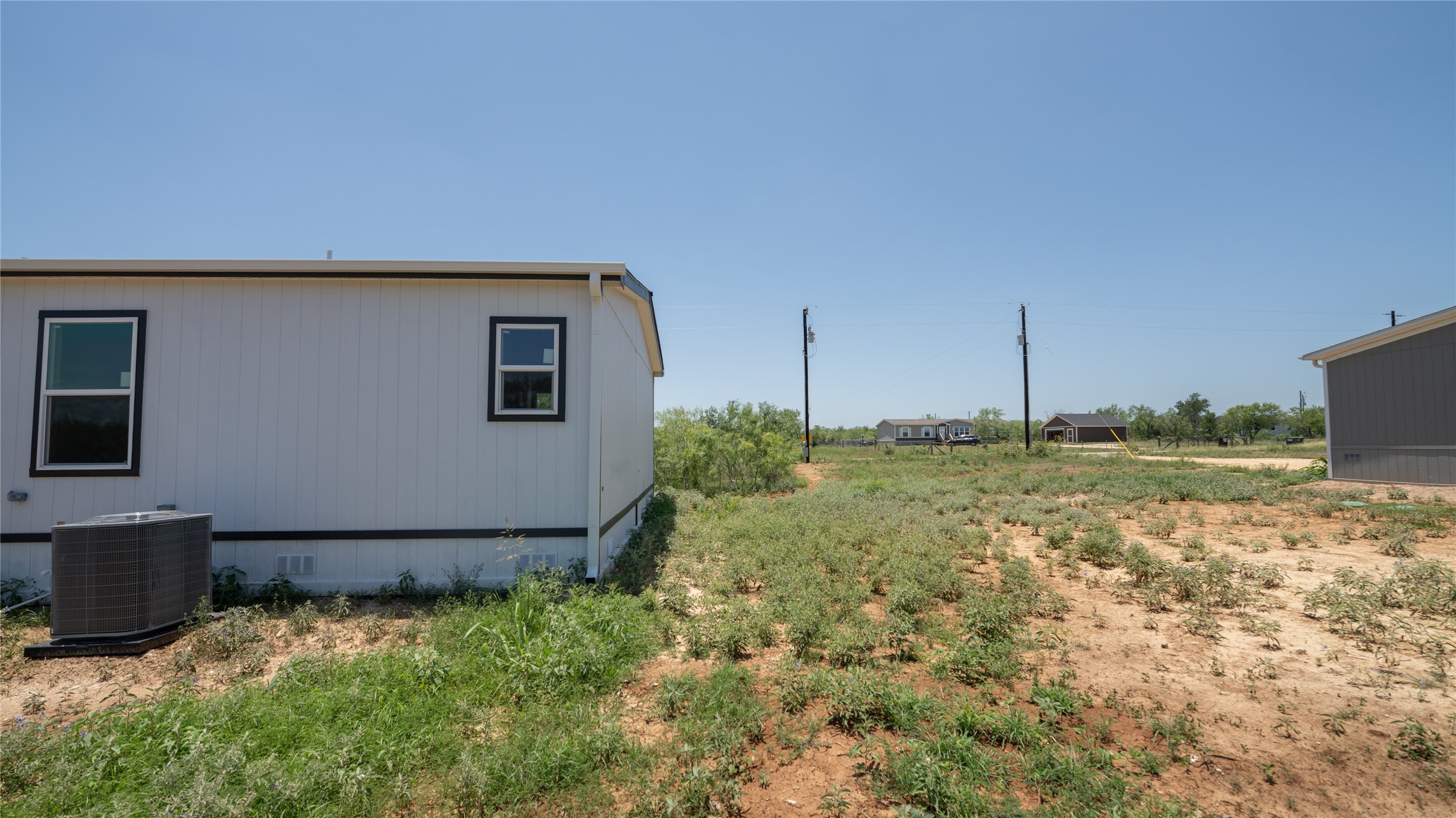 1145 Callihan Road Luling, TX 78648 - Photo 4 of 39 a house view with a outdoor space