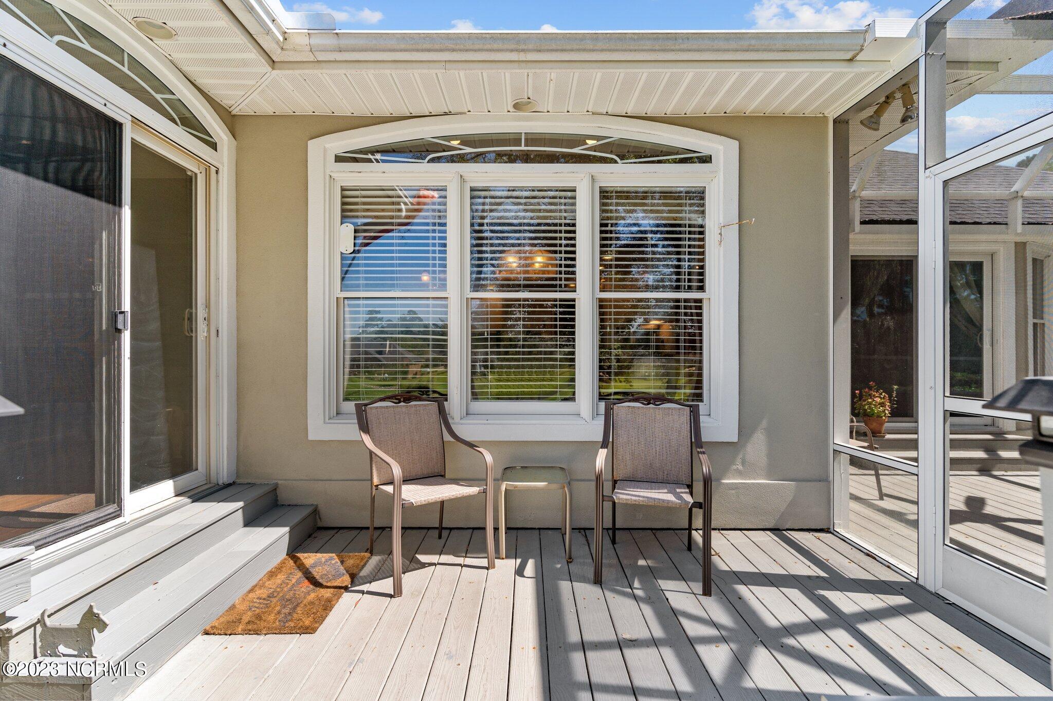 209 Rice Mill Circle Sunset Beach, NC 28468 - Photo 37 of 53 Large Lanai screened area