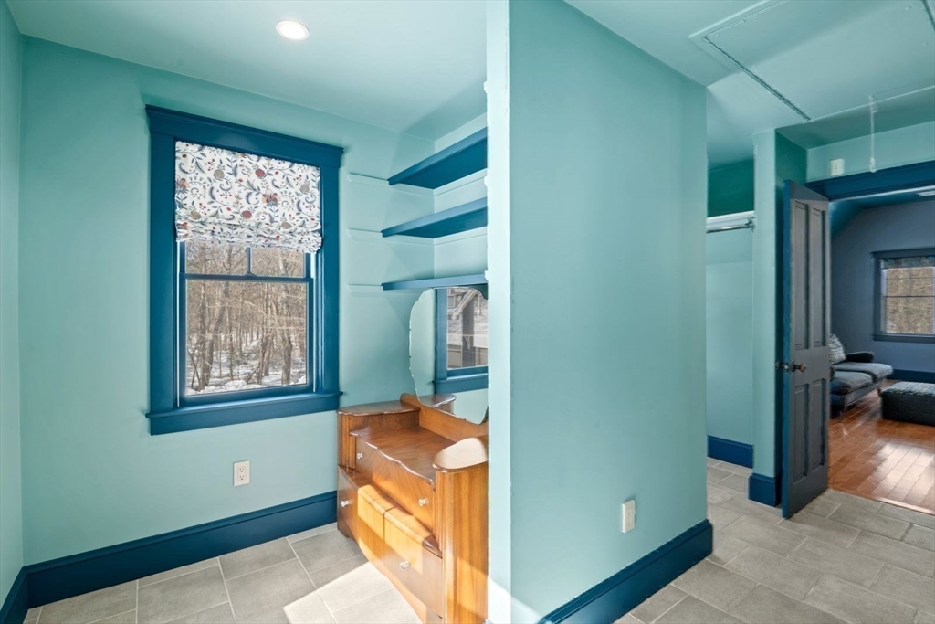 2 Spingler Way Hamilton, MA 01982 - Photo 30 of 40 a view of hallway with a large mirror and a window