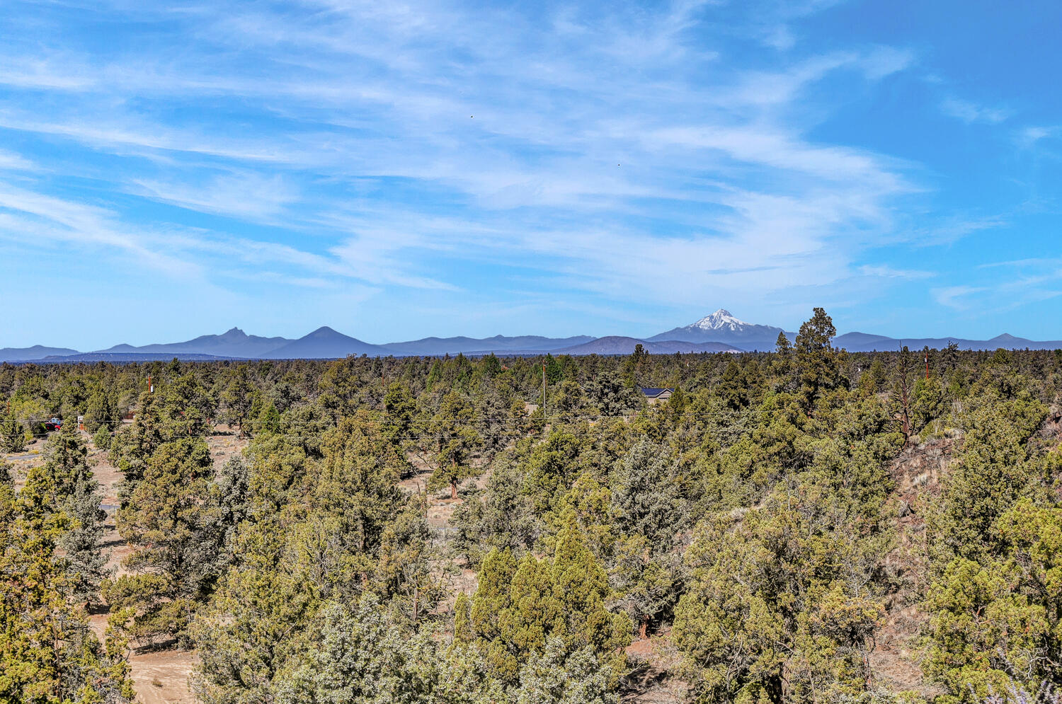 62860 Deschutes Road Bend, OR 97701 - Photo 32 of 34 Looking toward the North of the Cascade Mountains. A camera cannot capture the full range view of the mountains from this property.