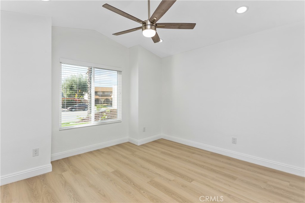 304 North Dearborn Street Redlands, CA 92374 - Photo 19 of 39 an empty room with a window and a ceiling fan