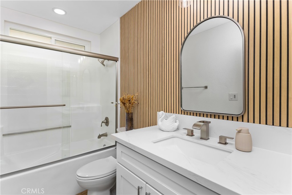 304 North Dearborn Street Redlands, CA 92374 - Photo 21 of 39 a bathroom with a sink and a mirror