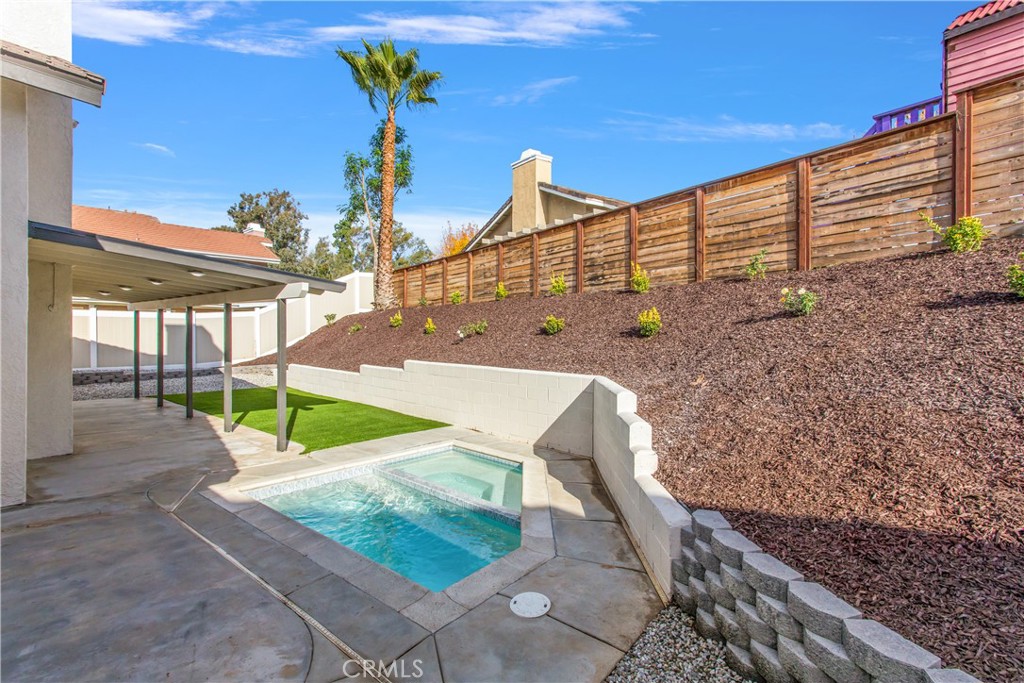 304 North Dearborn Street Redlands, CA 92374 - Photo 28 of 39 a view of yard with swimming pool