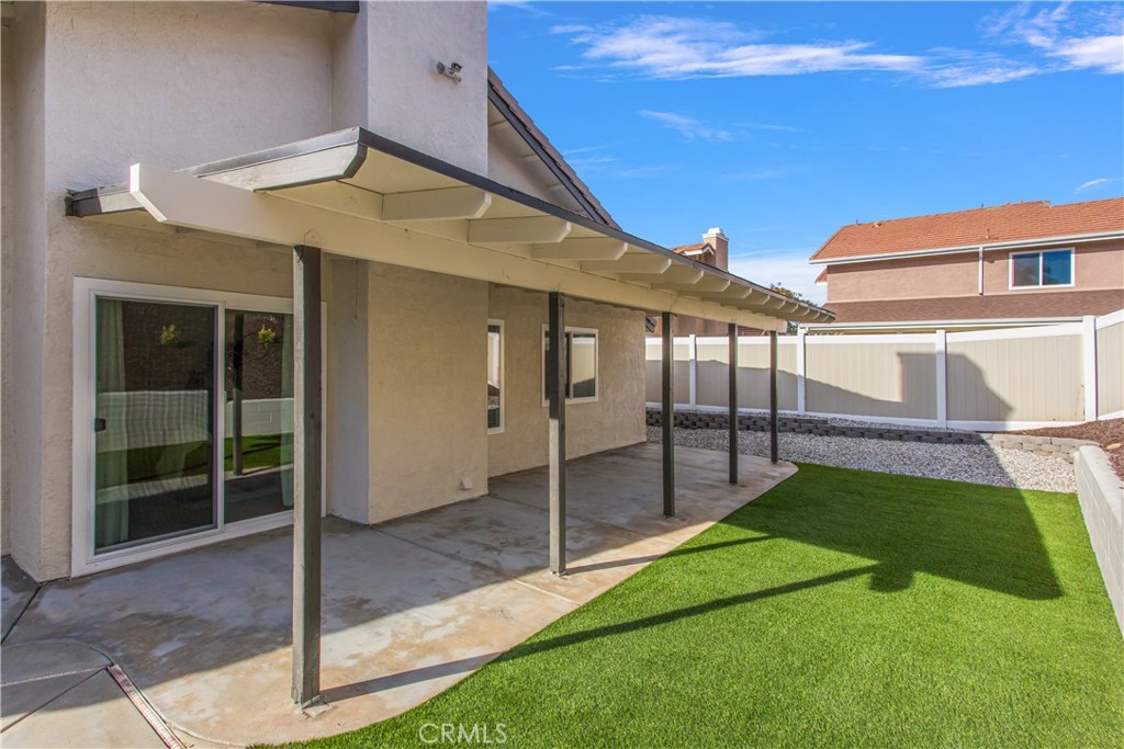 304 North Dearborn Street Redlands, CA 92374 - Photo 31 of 39 a view of a house with a yard and porch