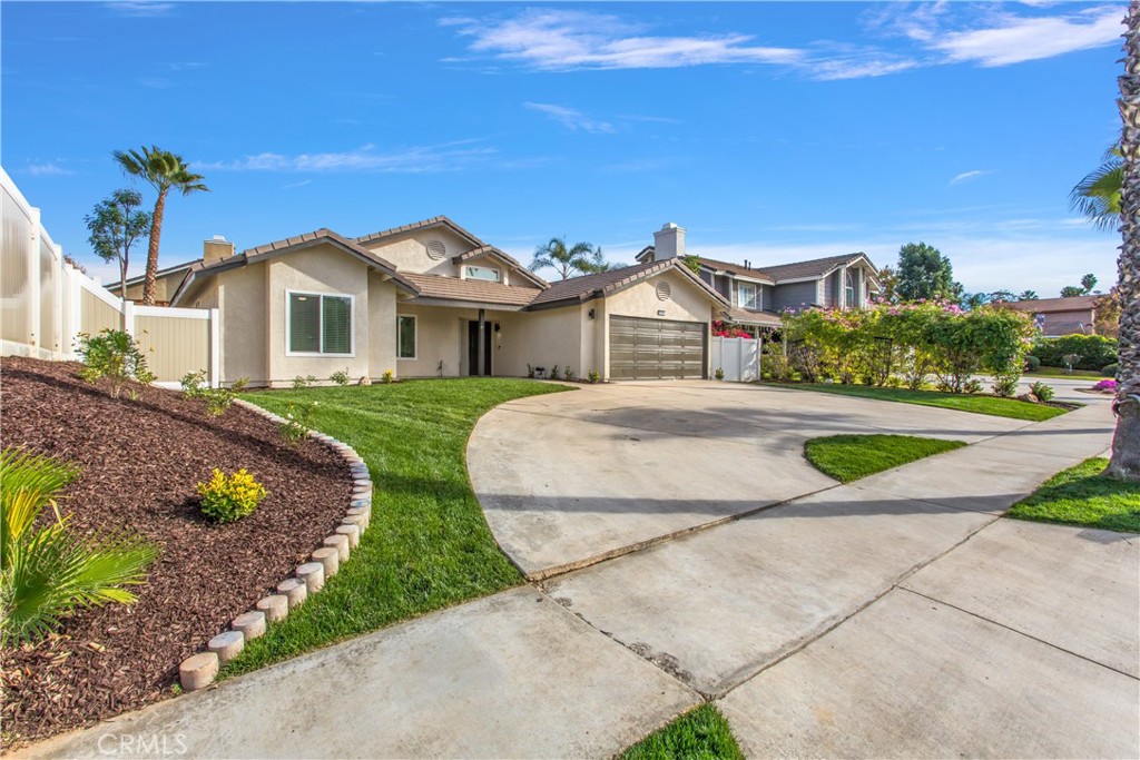 304 North Dearborn Street Redlands, CA 92374 - Photo 4 of 39 a view of a house with a yard and potted plants