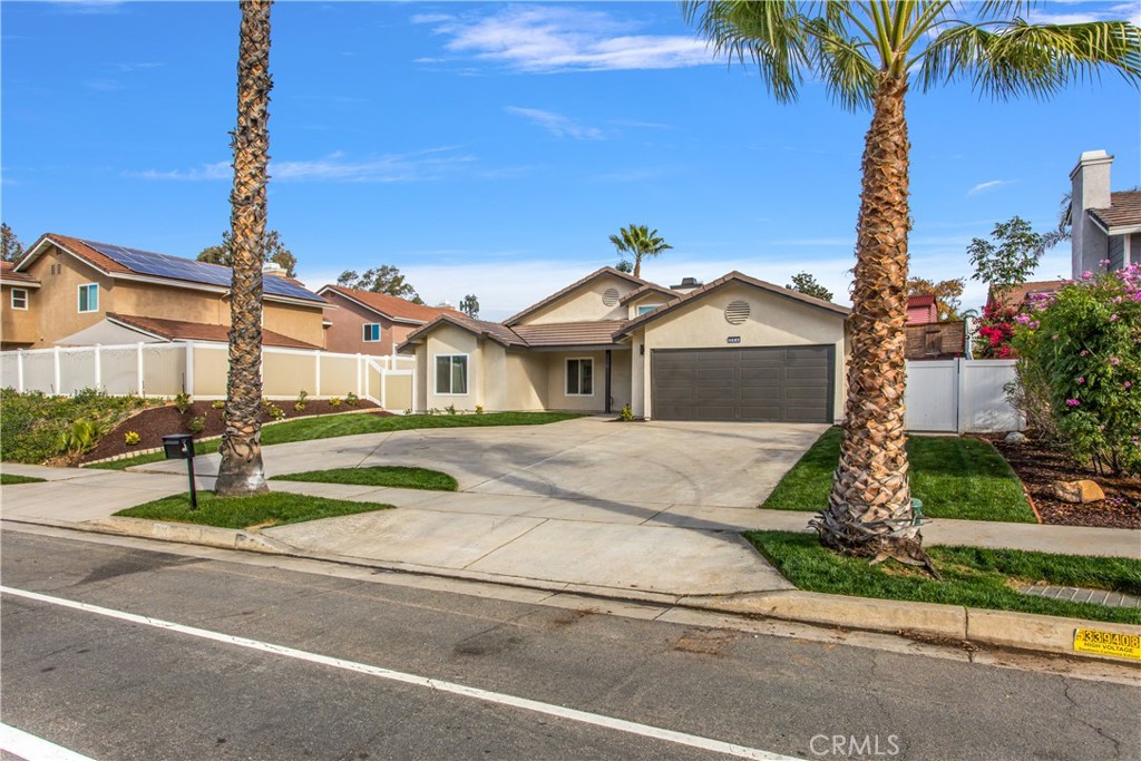 304 North Dearborn Street Redlands, CA 92374 - Photo 6 of 39 a front view of a house with a yard