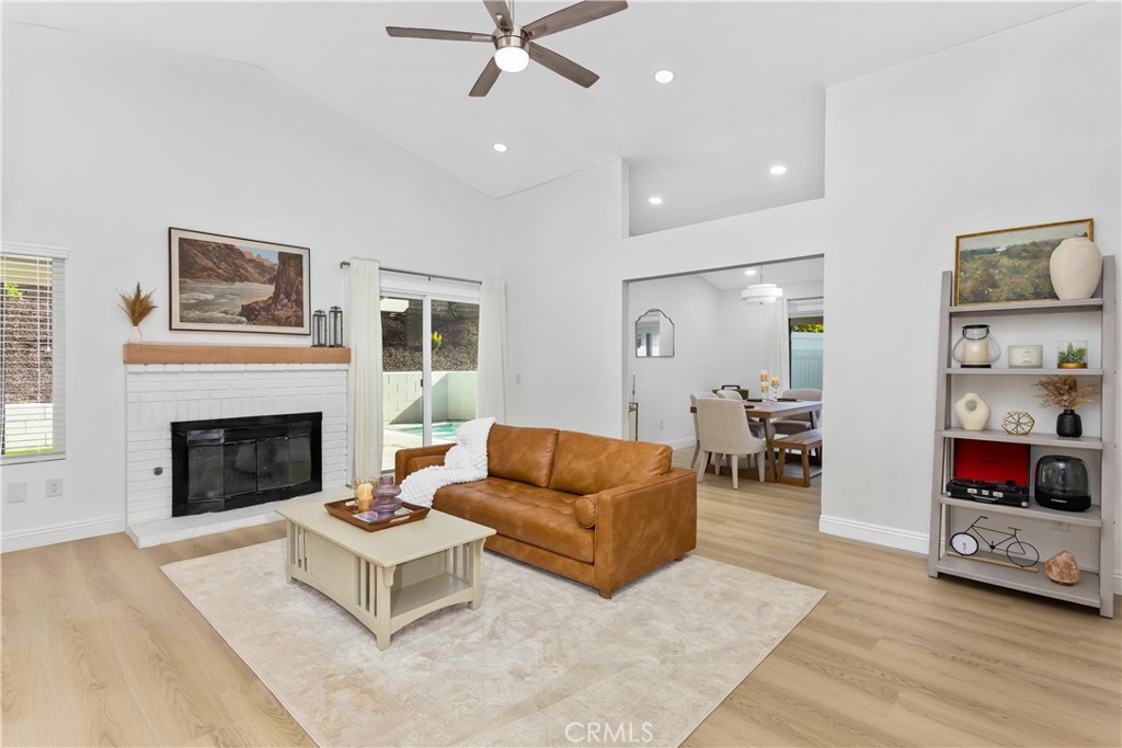 304 North Dearborn Street Redlands, CA 92374 - Photo 9 of 39 a living room with furniture and a fireplace