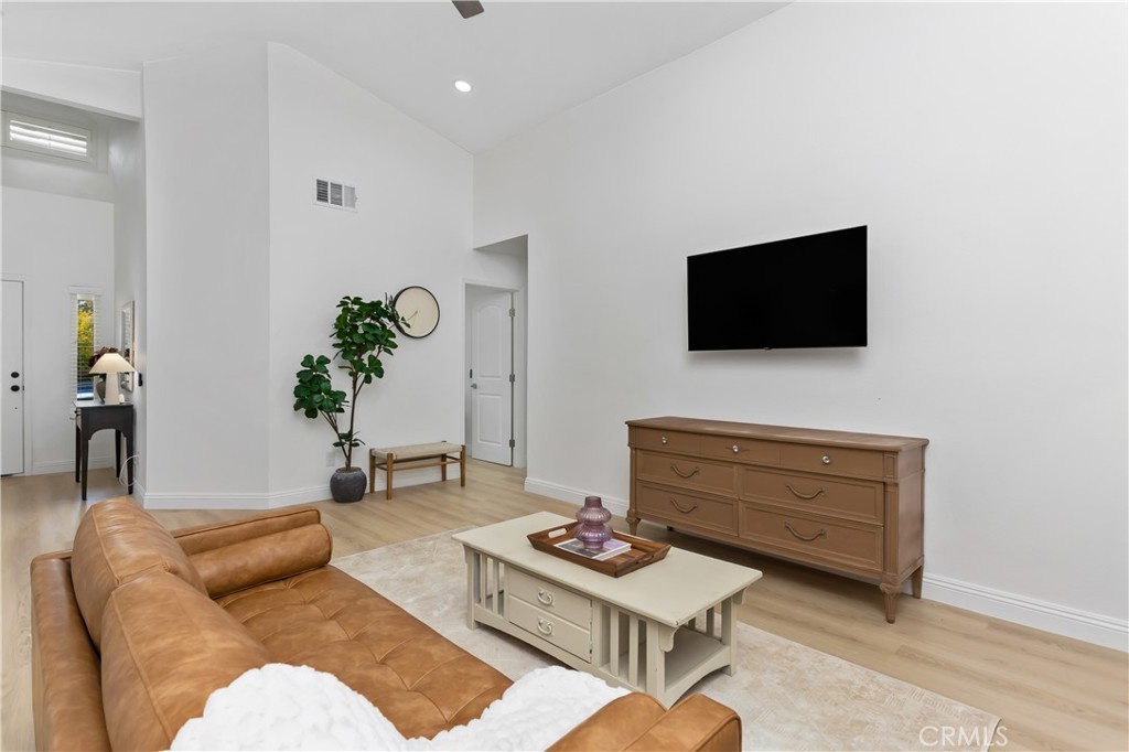 304 North Dearborn Street Redlands, CA 92374 - Photo 10 of 39 a living room with furniture and a flat screen tv