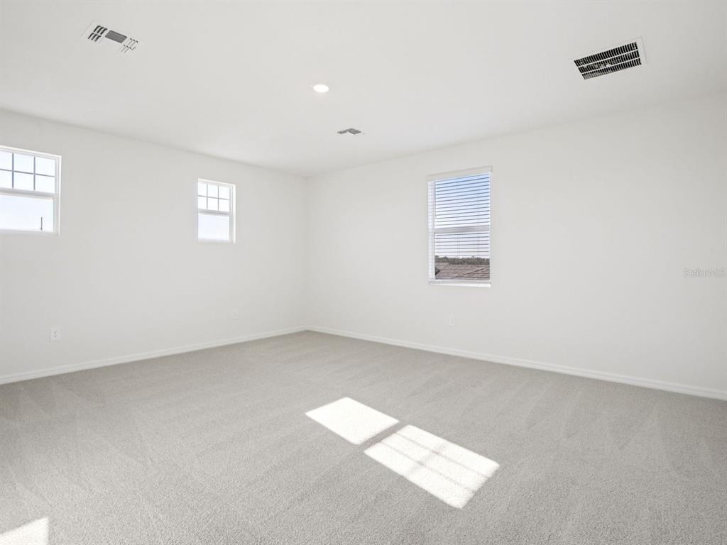 13311 Shellmore Avenue Palmetto, FL 34221 - Photo 21 of 46 an empty room with a window