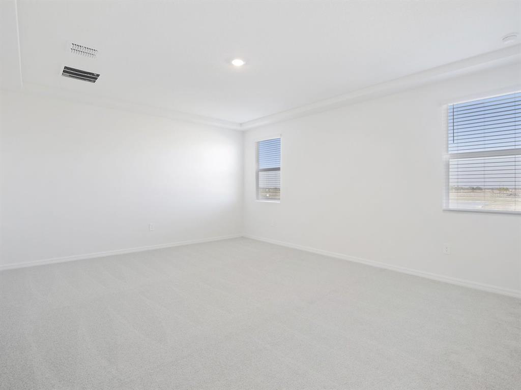 13311 Shellmore Avenue Palmetto, FL 34221 - Photo 25 of 46 an empty room with a window