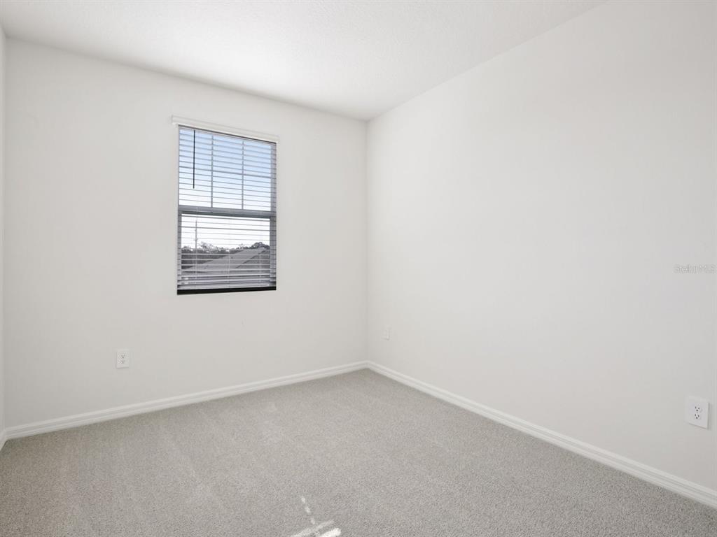 13311 Shellmore Avenue Palmetto, FL 34221 - Photo 38 of 46 an empty room with a window