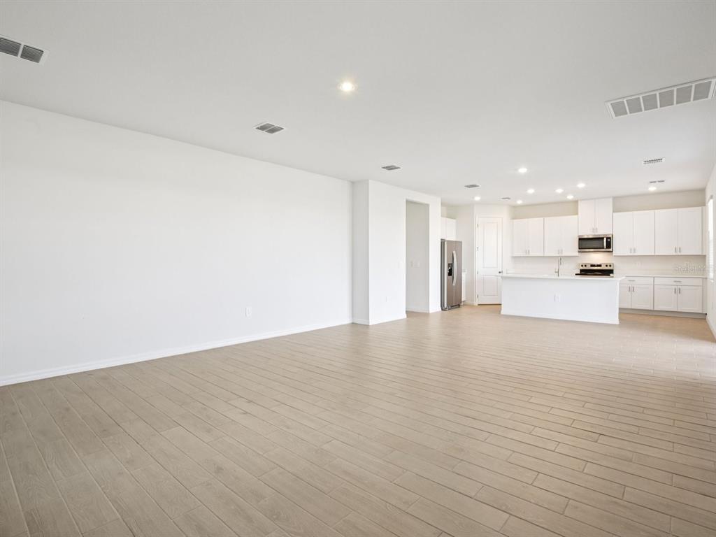 13311 Shellmore Avenue Palmetto, FL 34221 - Photo 8 of 46 a view of an empty room with a window