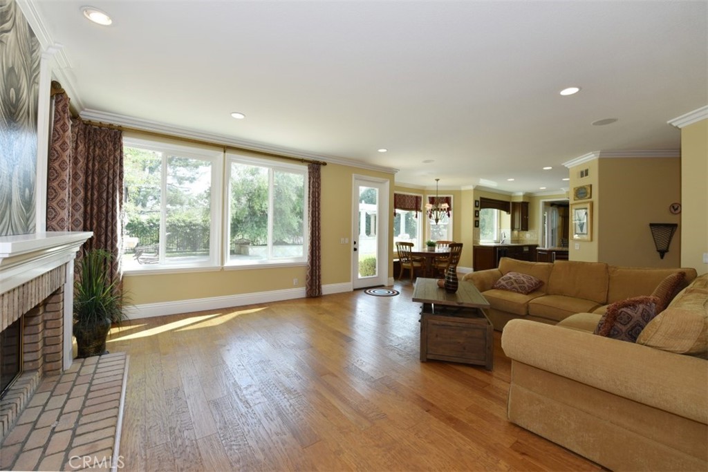 12 Brigadier Irvine, CA 92603 - Photo 20 of 50 a living room with furniture and a fireplace