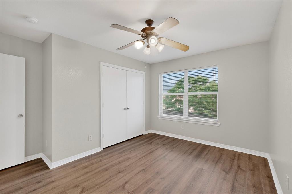 3401 Newgate Street Midlothian, TX 76065 - Photo 27 of 34 Spacious room featuring wood-finish flooring, light grey painted walls, and white trim