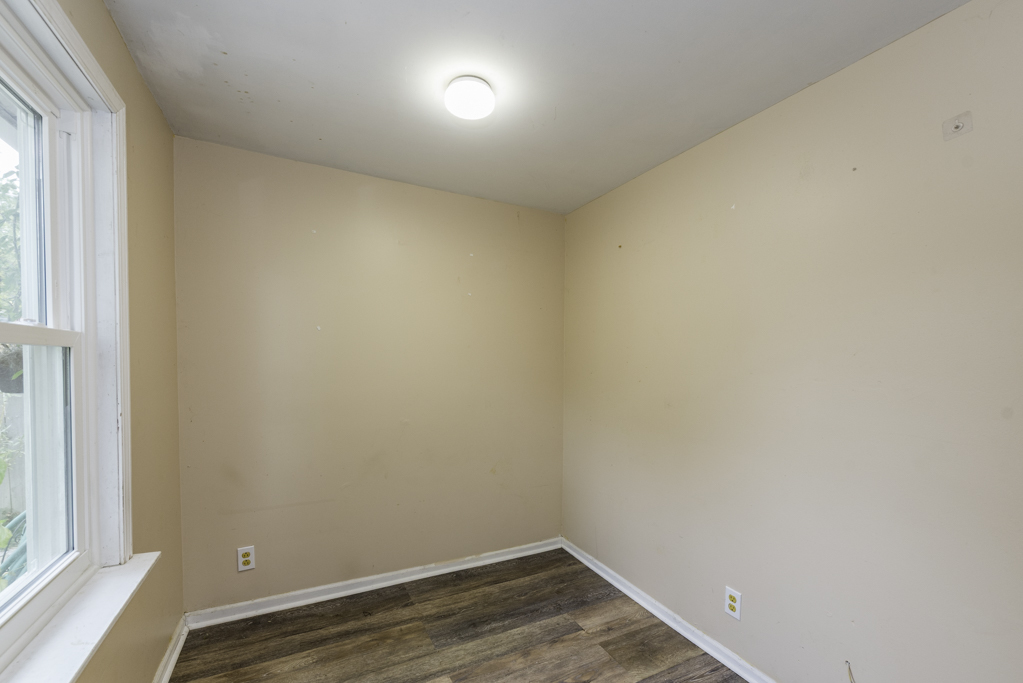511 Chestnut Street Waukegan, IL 60085 - Photo 13 of 25 a view of small space with wooden floor and windows