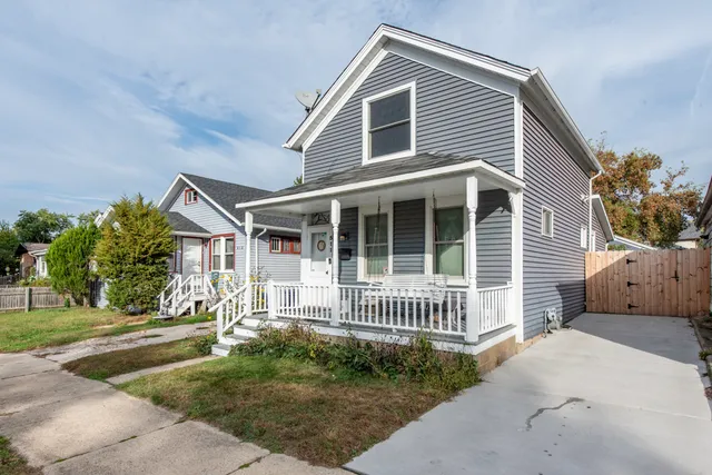 a front view of a house with a porch