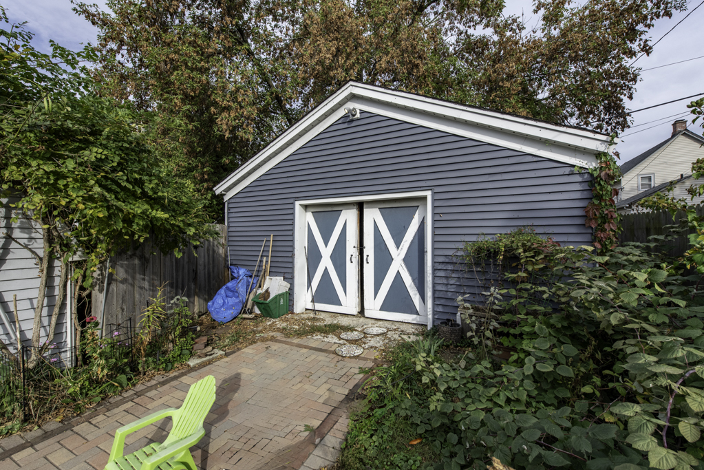 511 Chestnut Street Waukegan, IL 60085 - Photo 25 of 25 a front view of a house with garden