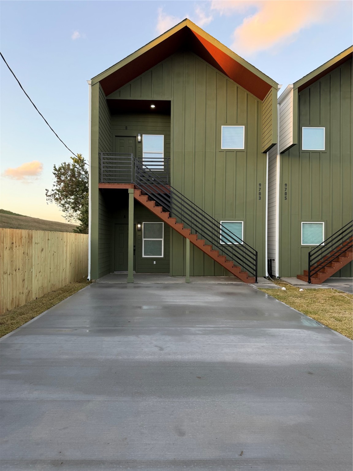 9725 Kerr A-b Street Houston, TX 77029 - Photo 3 of 22 a front view of a house with a garage