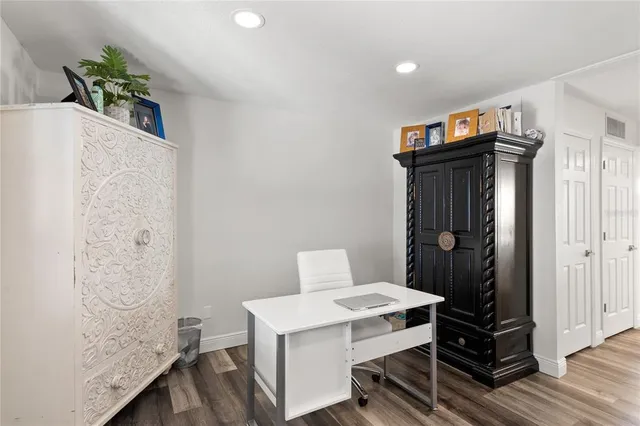 a view of kitchen with wooden floor