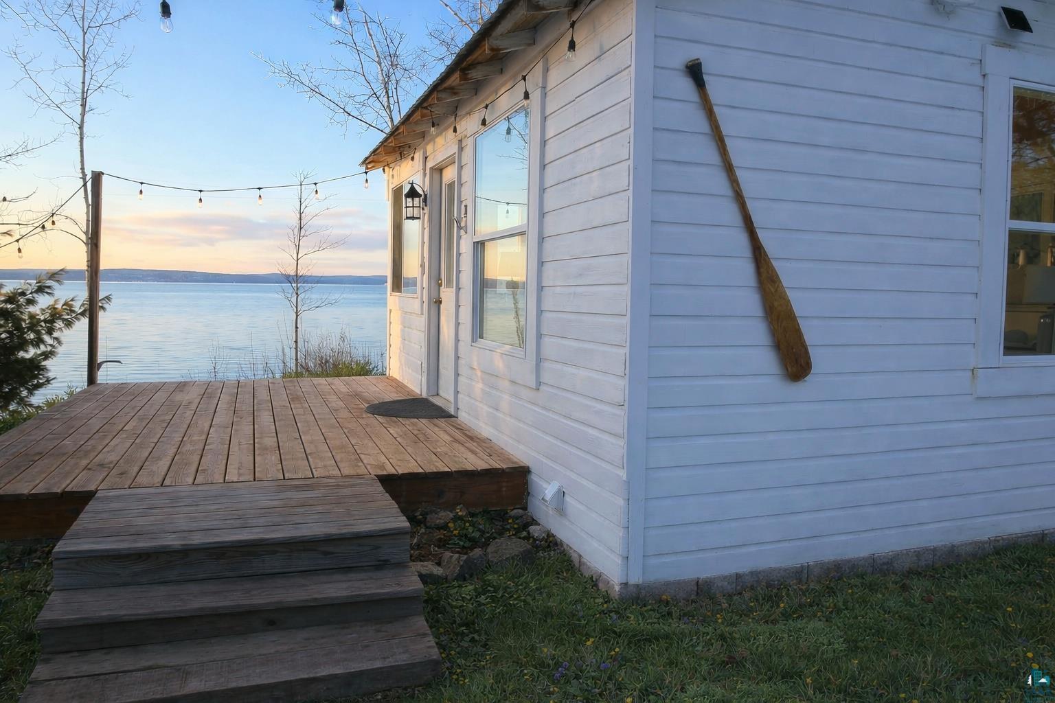 4107 A Lake Park Road Ashland, WI 54806 - Photo 2 of 12 View of home's exterior with a deck with water view