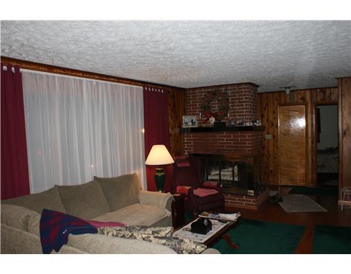 1893 New Centerville Road Somerset, PA 15501 - Photo 5 of 14 Living Room. Has H/W floors, and wood burning fire place