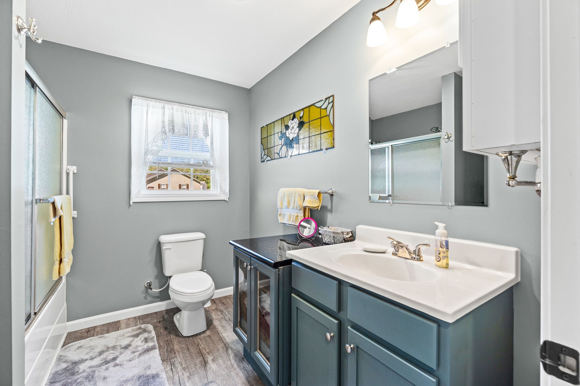 237 Fremont Road Doyle, TN 38559 - Photo 14 of 29 a bathroom with a sink toilet and a mirror