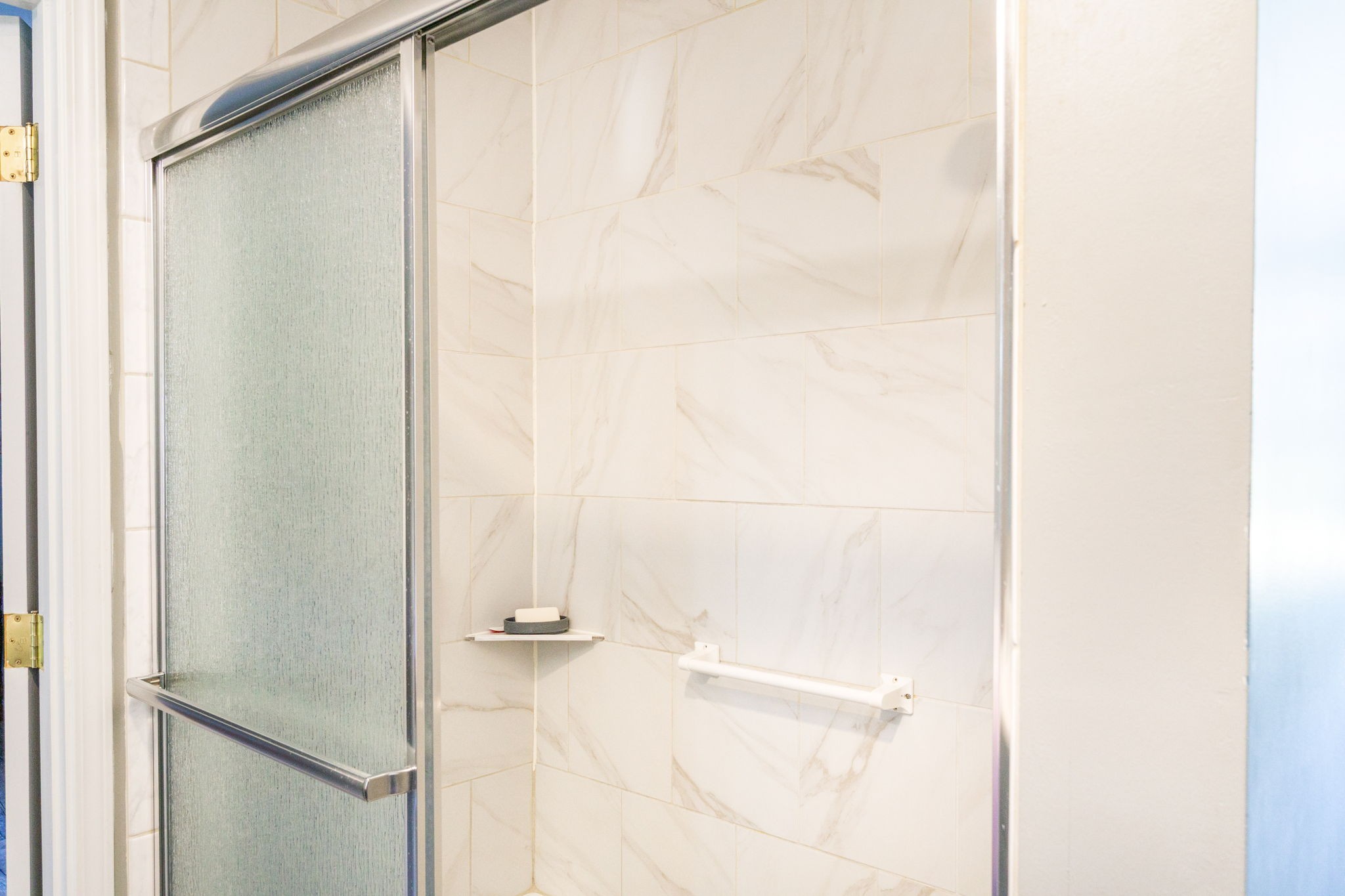 237 Fremont Road Doyle, TN 38559 - Photo 15 of 29 a bathroom with a glass shower door