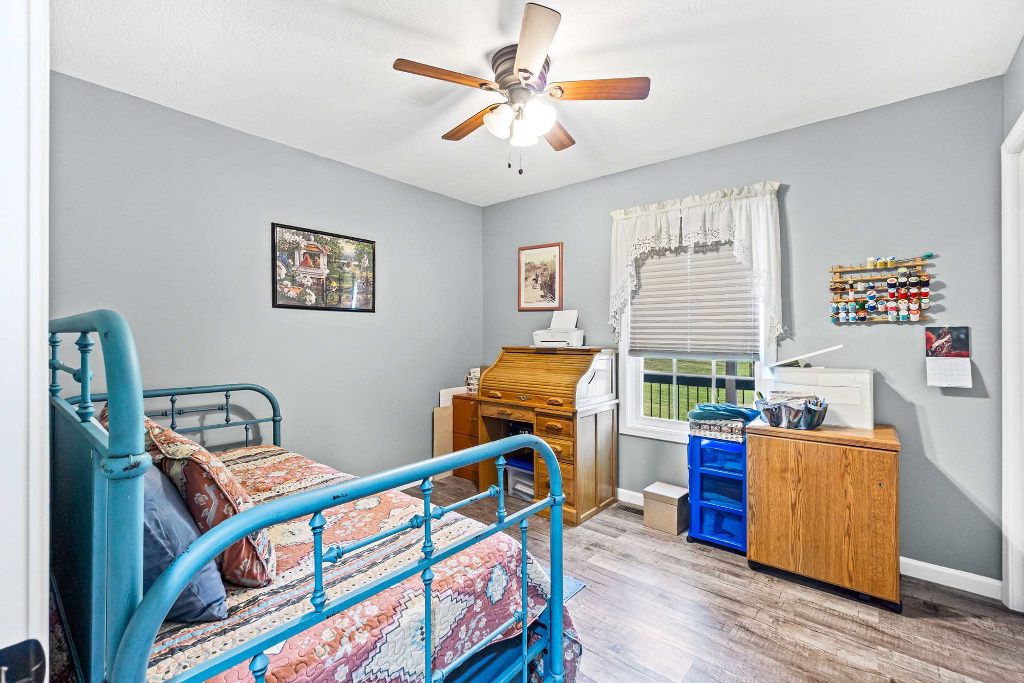 237 Fremont Road Doyle, TN 38559 - Photo 16 of 29 a bedroom with furniture and a baby crib