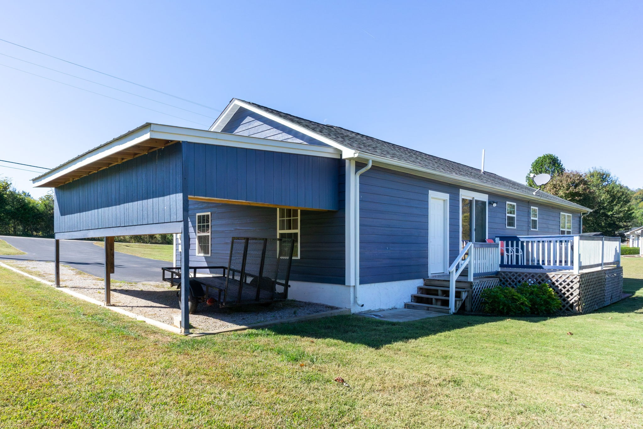 237 Fremont Road Doyle, TN 38559 - Photo 22 of 29 a view of a house with a yard and furniture