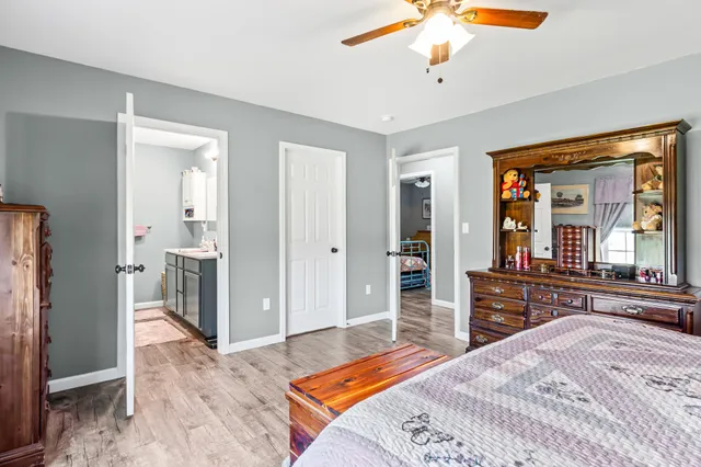 a bathroom with a sink vanity and a mirror