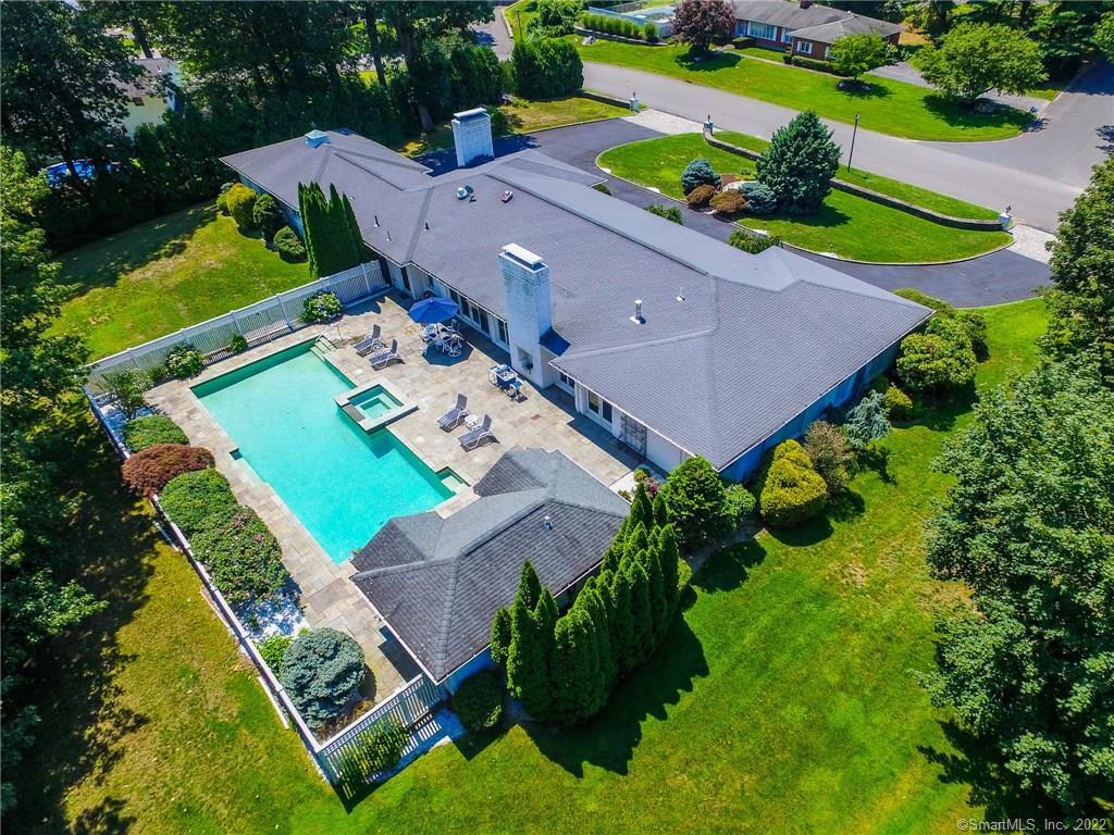 an aerial view of a house with a garden